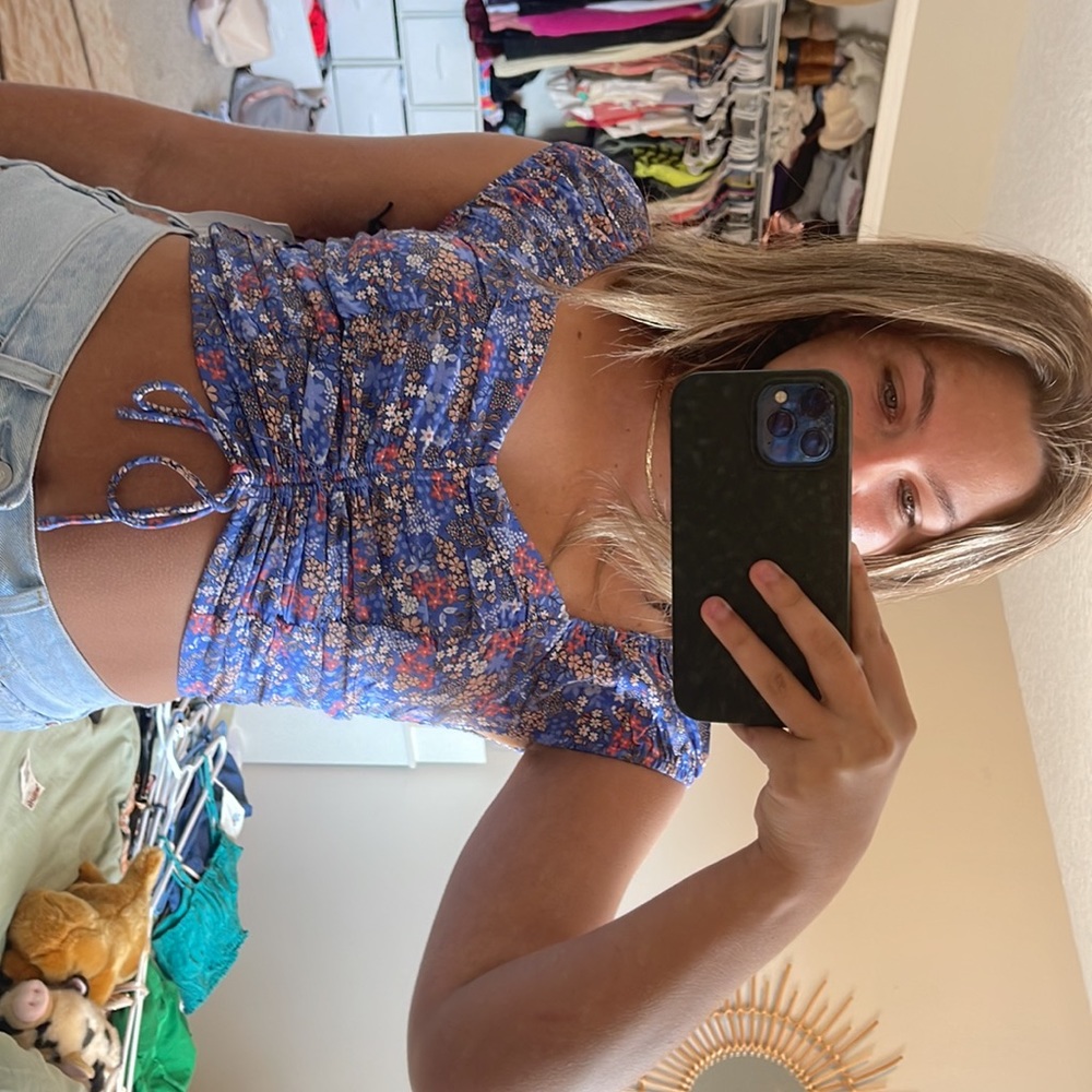 Never worn blue floral cap sleeve top